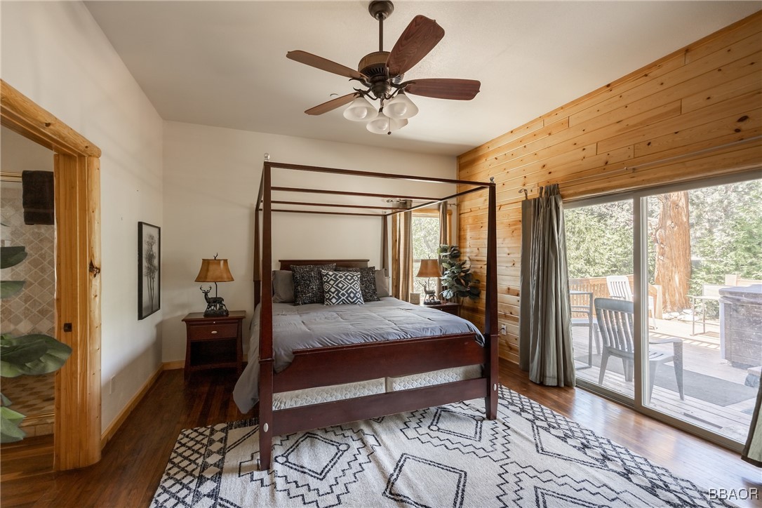 42577 Bear Loop Big Bear City, CA 92314 - Photo 22 of 38 a bedroom with a bed and a window