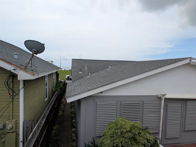 a house view with a backyard space