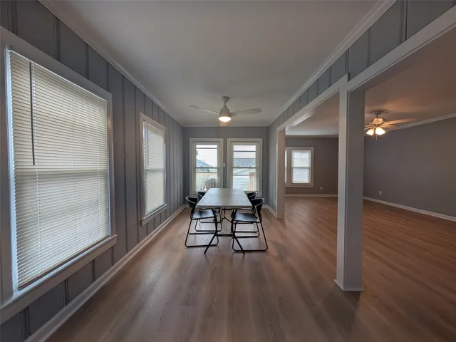 a view of a livingroom with furniture and wooden floor