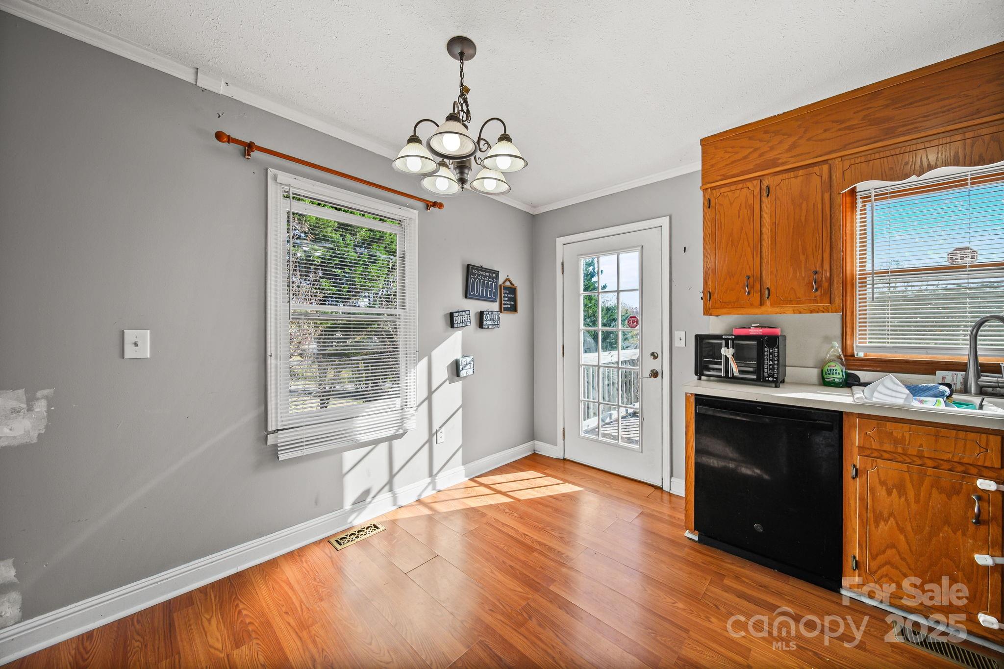 3405 Clarks Chapel Road Lenoir, NC 28645 - Photo 12 of 25 a living room with stainless steel appliances granite countertop furniture and a fireplace
