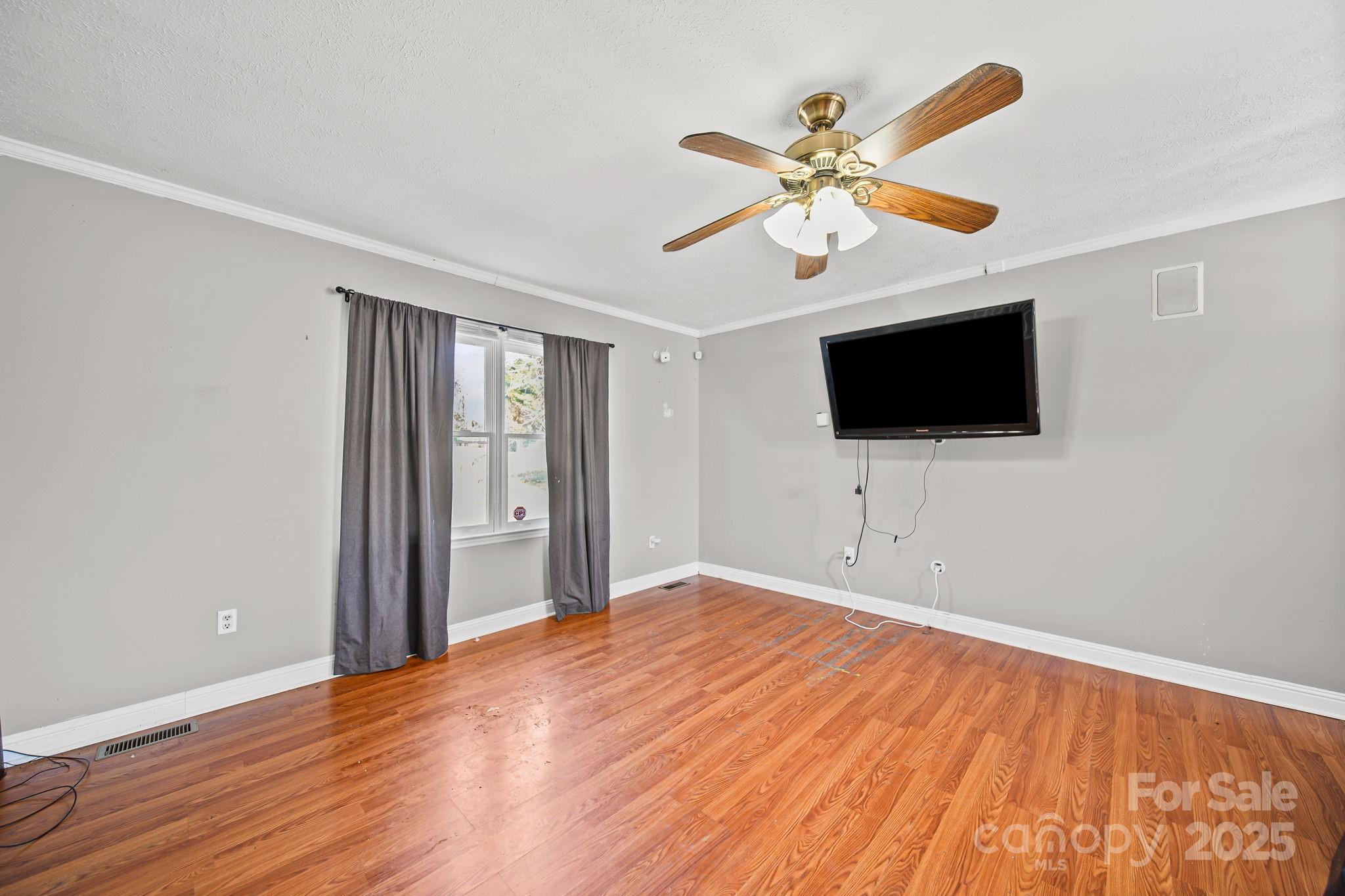 3405 Clarks Chapel Road Lenoir, NC 28645 - Photo 14 of 25 a view of a livingroom with a flat screen tv