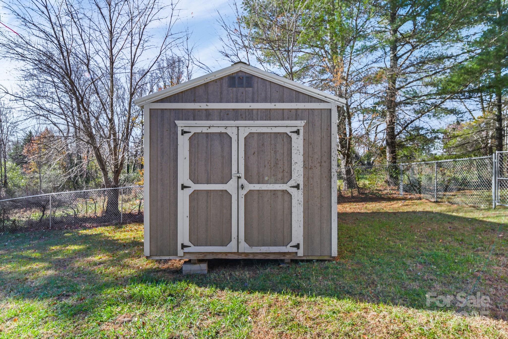 3405 Clarks Chapel Road Lenoir, NC 28645 - Photo 8 of 25 a front view of a house with garden