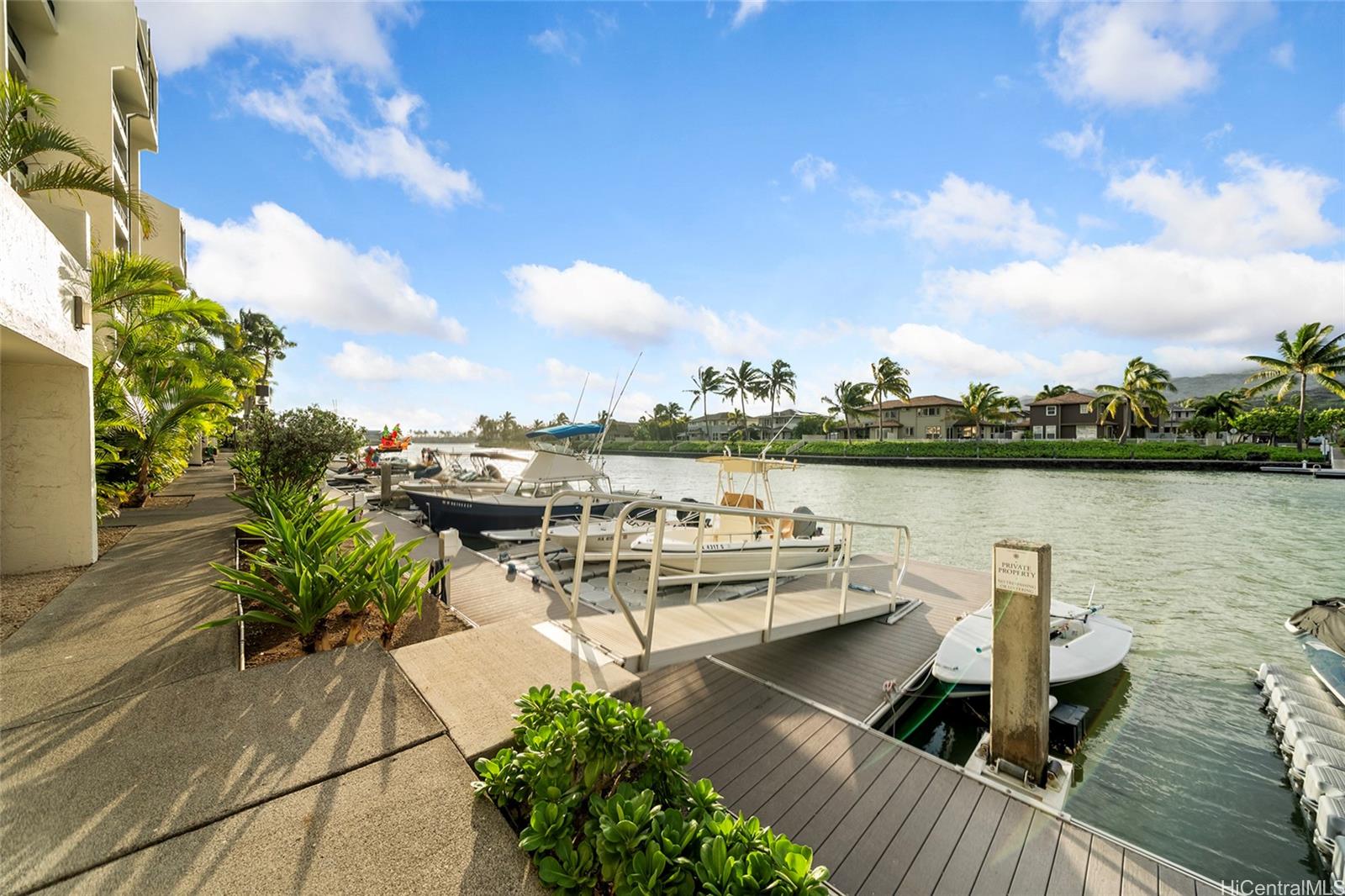 500 Lunalilo Home Road, Unit 26L Honolulu, HI 96825 - Photo 17 of 24 a view of a lake with boats in front of house
