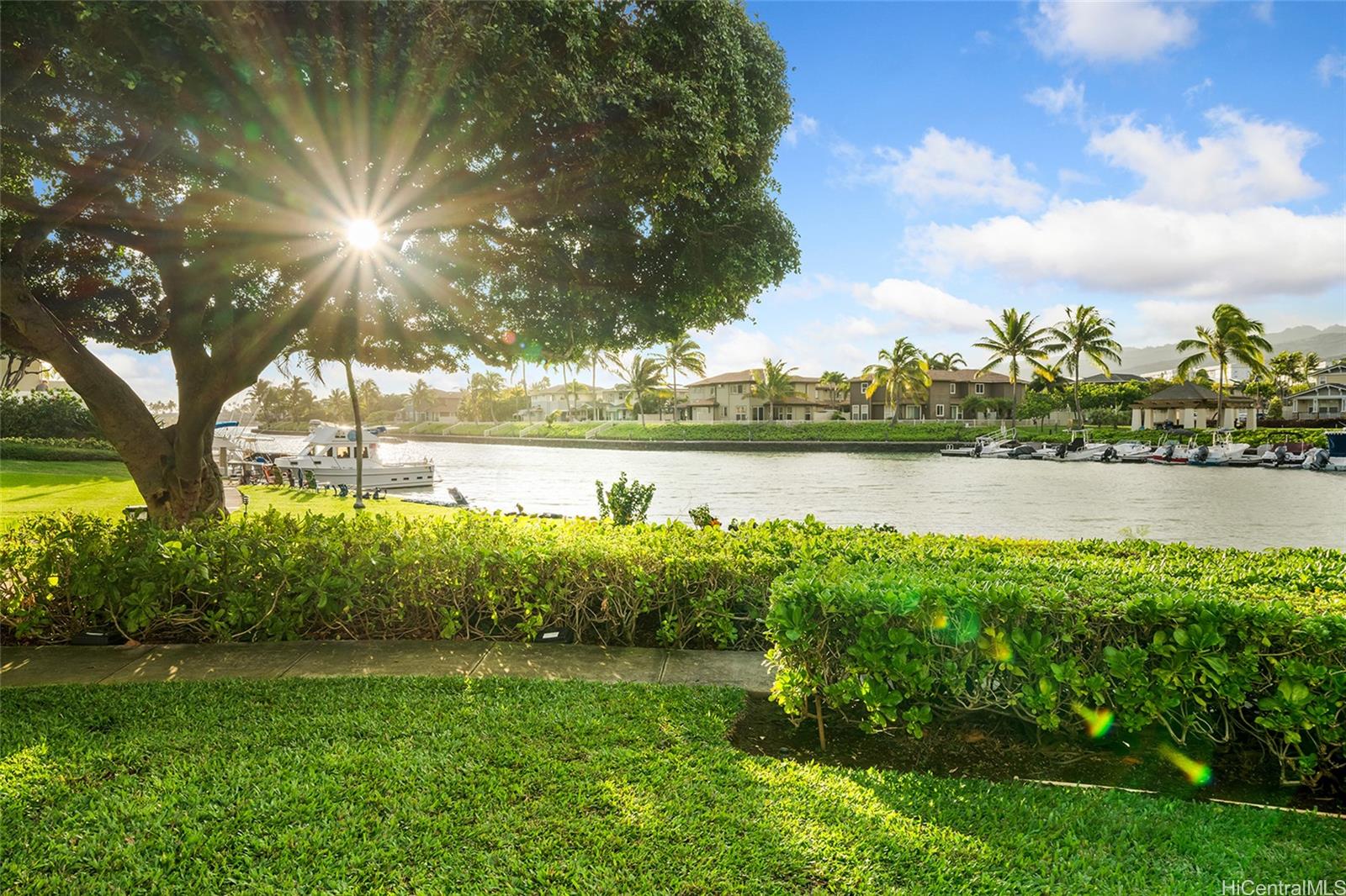 500 Lunalilo Home Road, Unit 26L Honolulu, HI 96825 - Photo 18 of 24 a view of a lake with a big yard