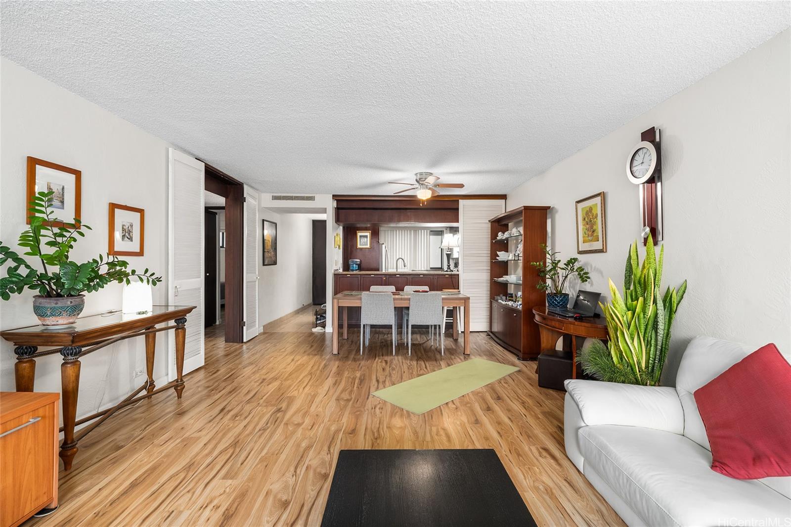 500 Lunalilo Home Road, Unit 26L Honolulu, HI 96825 - Photo 4 of 24 a living room with furniture and a table