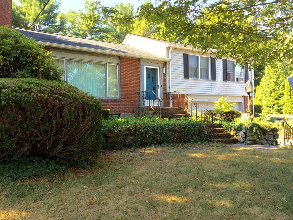 25 Wyman Road Lexington, MA 02420 - Photo 2 of 7 a view of a house with a garden