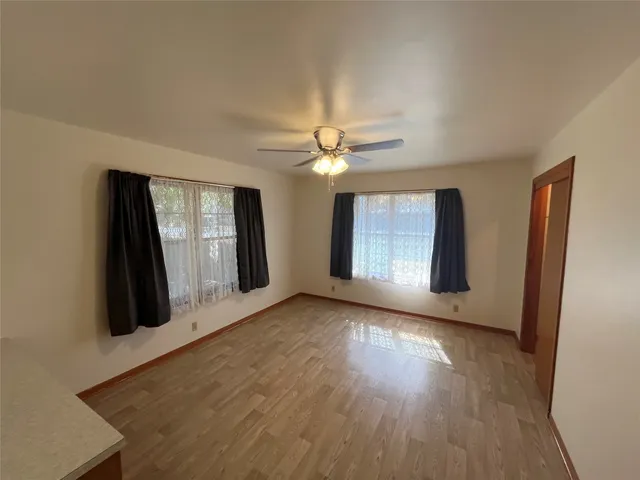 a kitchen with a refrigerator and a sink