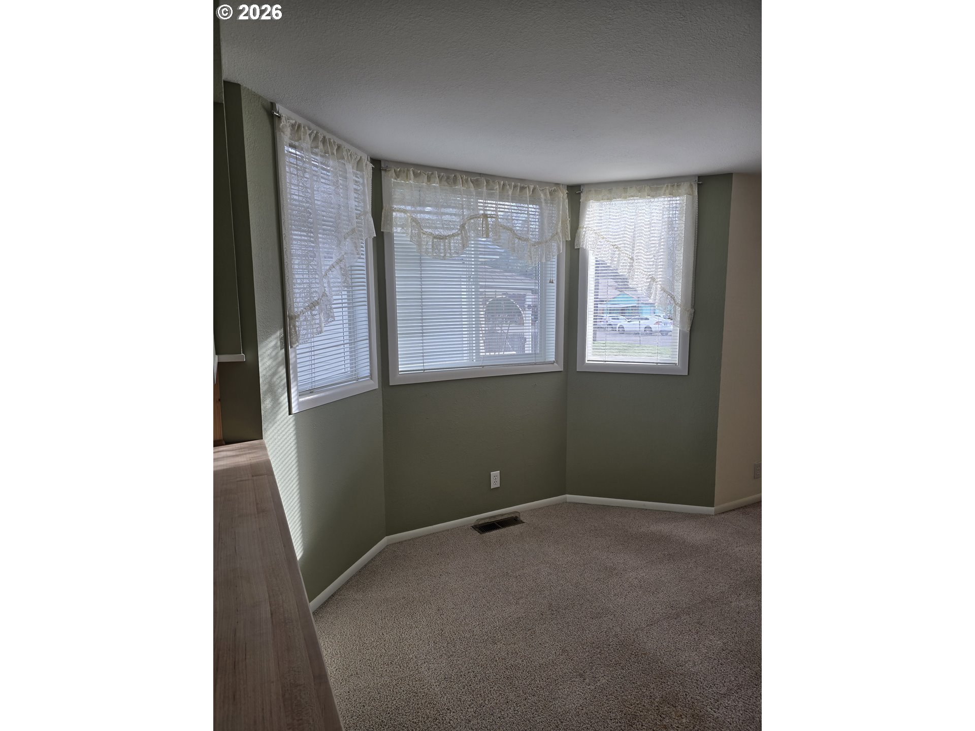 403 Southwest Depot Street Enterprise, OR 97828 - Photo 12 of 27 a view of an empty room with a window
