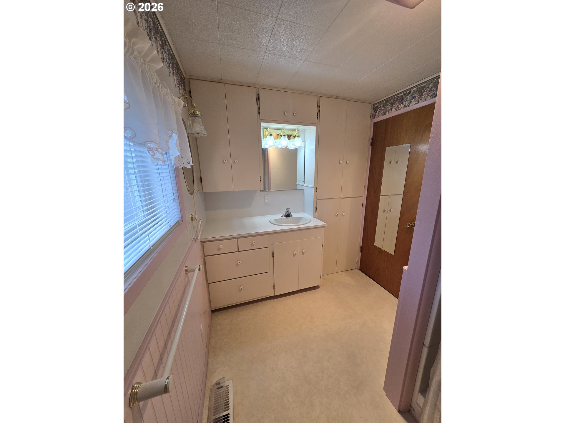 403 Southwest Depot Street Enterprise, OR 97828 - Photo 13 of 27 a bathroom with a sink and a mirror