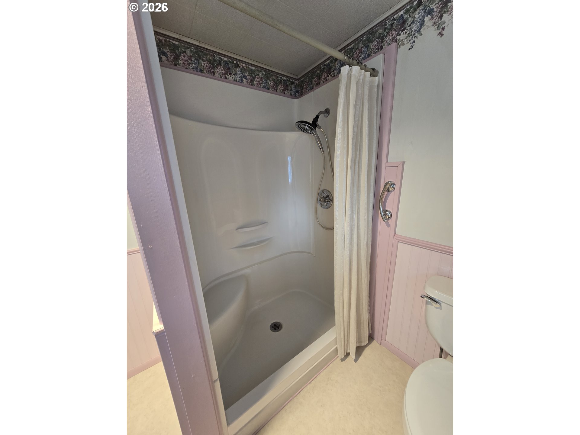 403 Southwest Depot Street Enterprise, OR 97828 - Photo 15 of 27 a bathroom with a glass shower door