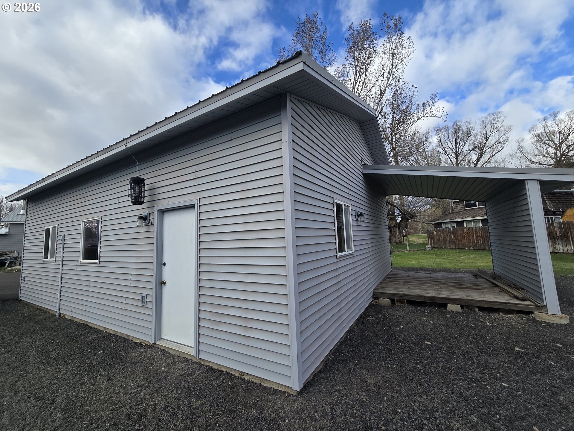 403 Southwest Depot Street Enterprise, OR 97828 - Photo 5 of 27 a front view of a house with a yard