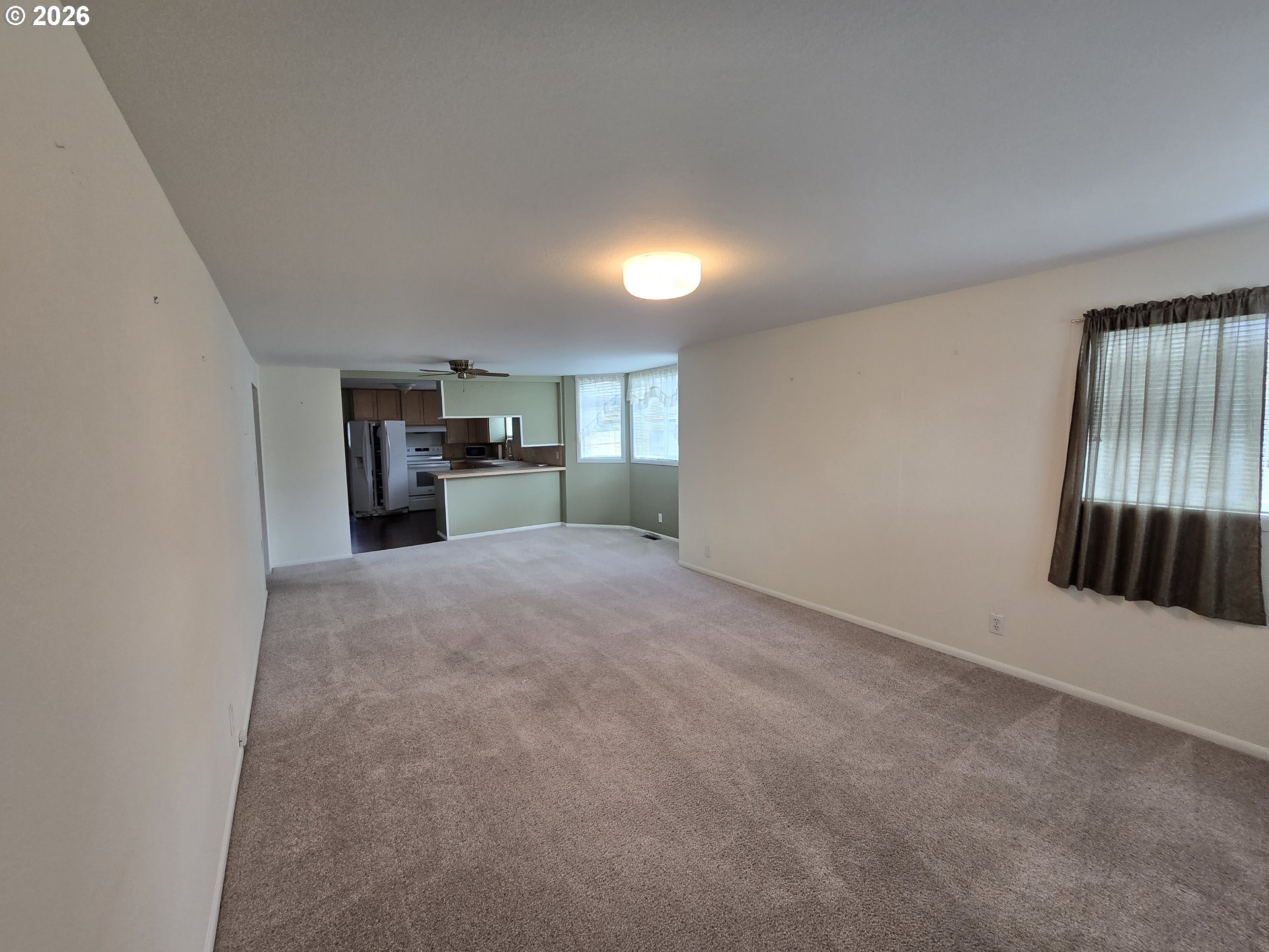 403 Southwest Depot Street Enterprise, OR 97828 - Photo 10 of 27 a view of a kitchen with a sink and dishwasher cabinets