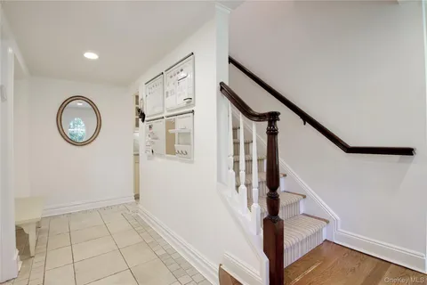 a bathroom with a sink a toilet and shower curtain