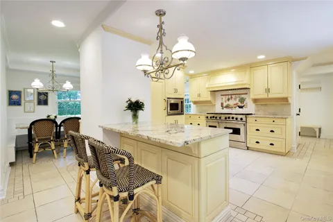 a very nice looking kitchen with a large window