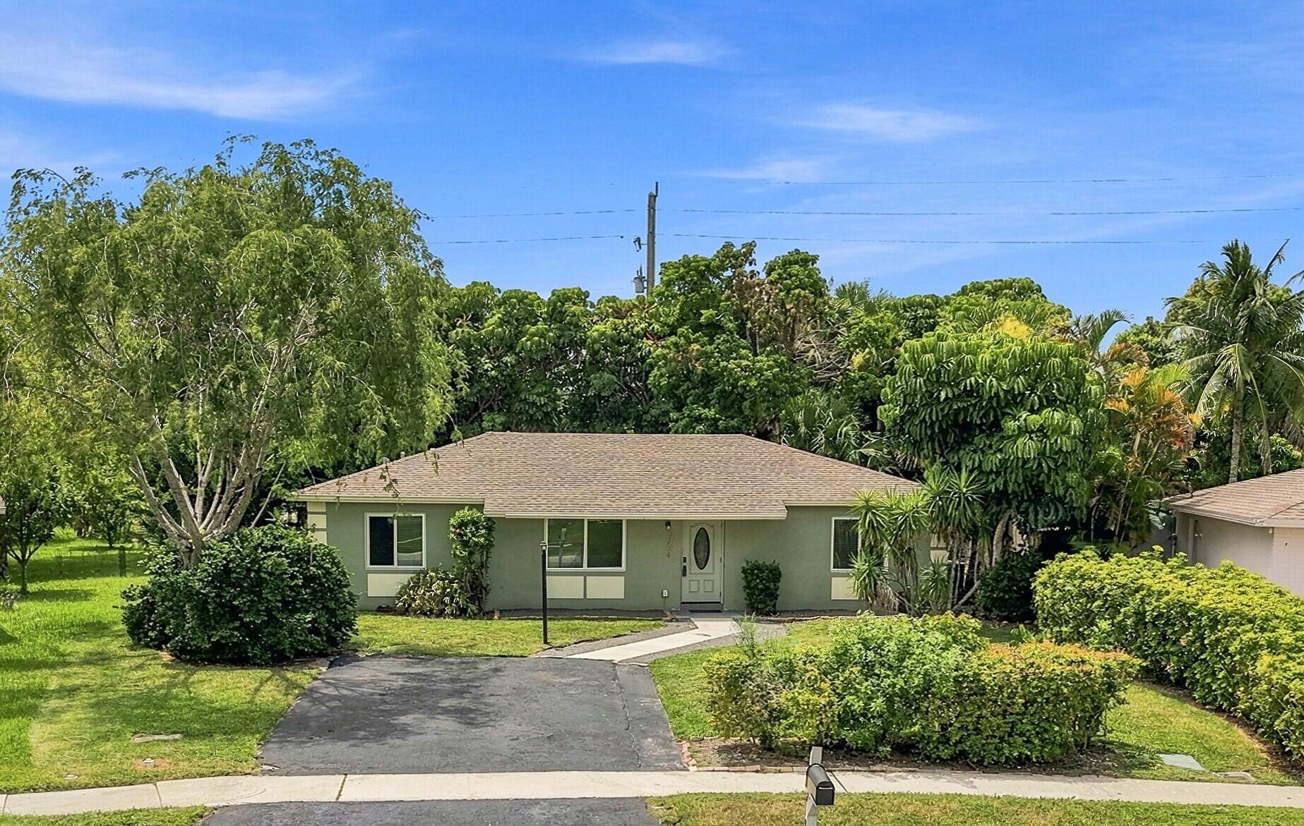 9734 Alaska Circle Boca Raton, FL 33434 - Photo 1 of 28 Front 1