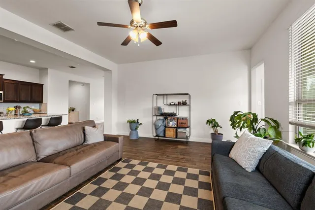 a living room with furniture and a couch