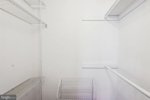 a view of a room with racks on the wall