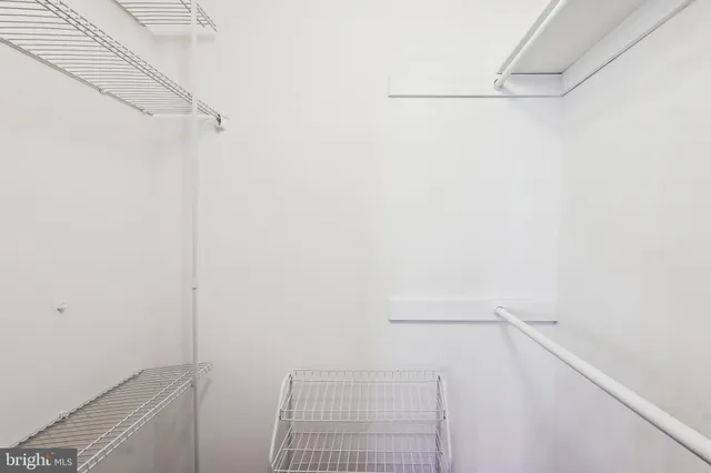 a view of a room with racks on the wall