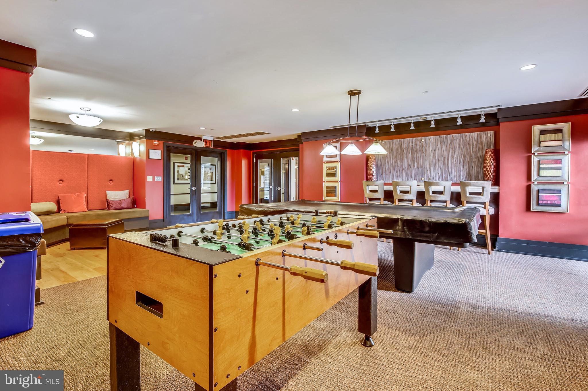 4500 South Four Mile Run Drive, Unit 129 Arlington, VA 22204 - Photo 22 of 34 a kitchen with a table and chairs in it