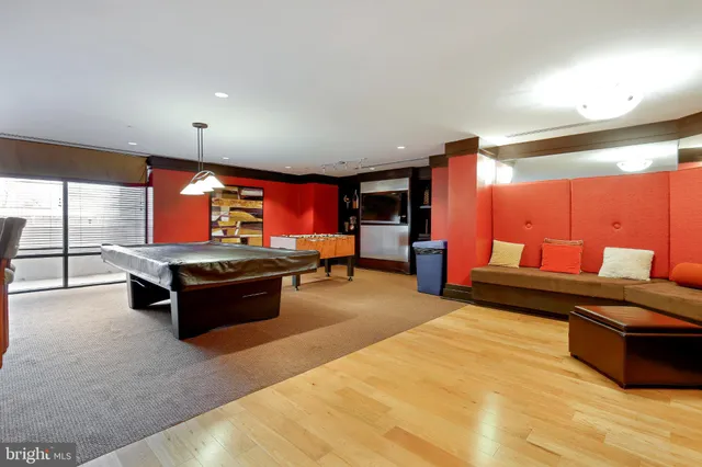 a kitchen with a table and chairs in it