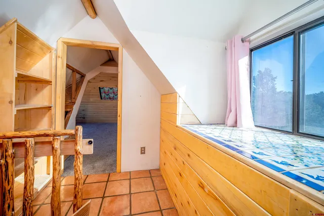 a view of an entryway with a lot of stuff