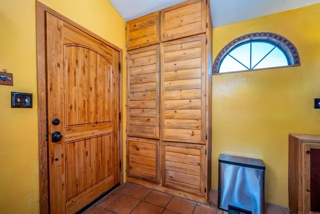 a view of a workspace with furniture