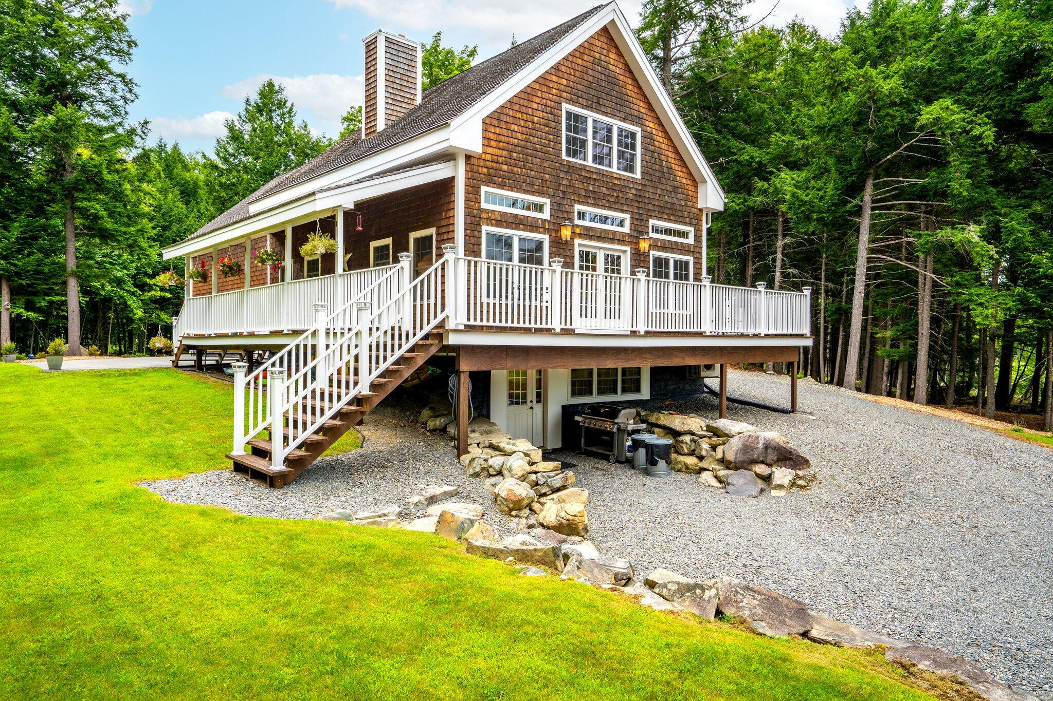 221 Rams Island Road Dover-Foxcroft, ME 04426 - Photo 8 of 75 Exterior of Home, Side Deck View