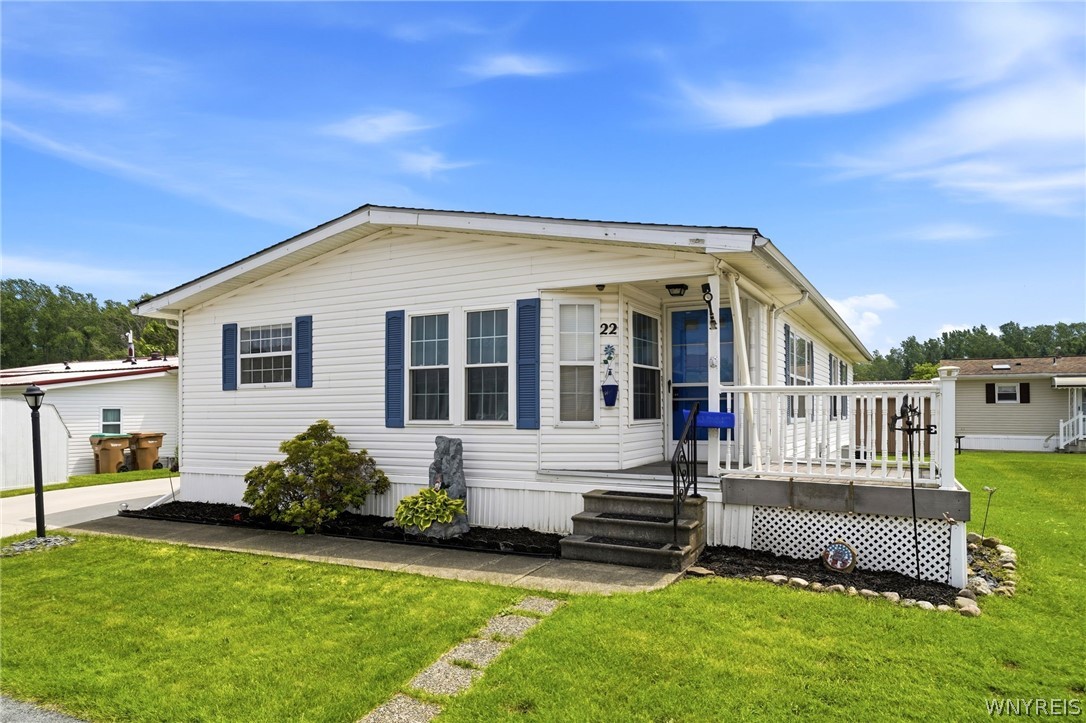 22 Cypress Road Cheektowaga, NY 14227 - Photo 2 of 28 Open front porch with retractable awning