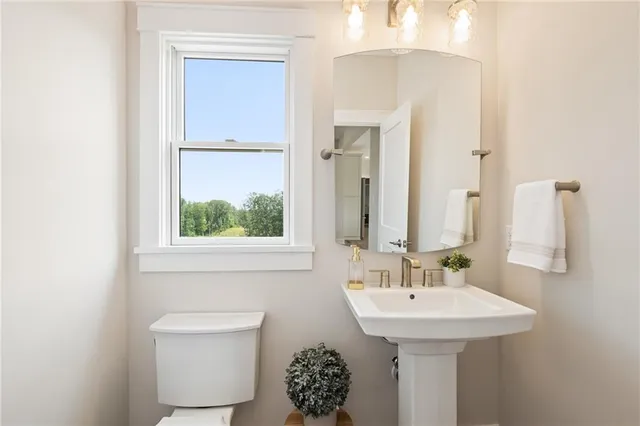 a view of a chairs on the roof deck