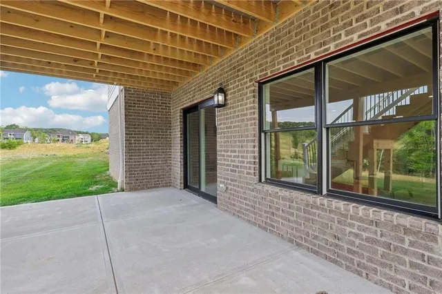 a view of a golf course with a lake