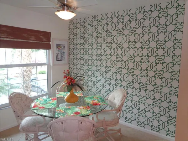 a vase of flowers sitting on a table