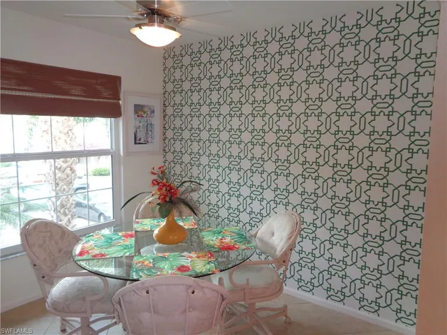 a vase of flowers sitting on a table