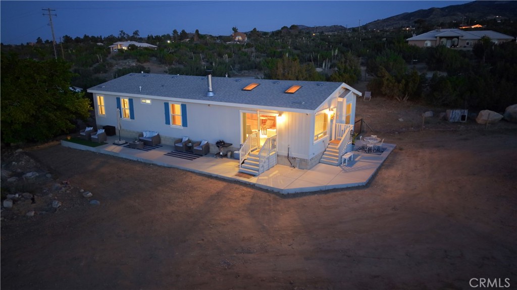 1330 Tamarack Road Pinon Hills, CA 92372 - Photo 2 of 19 a view of a house with a yard