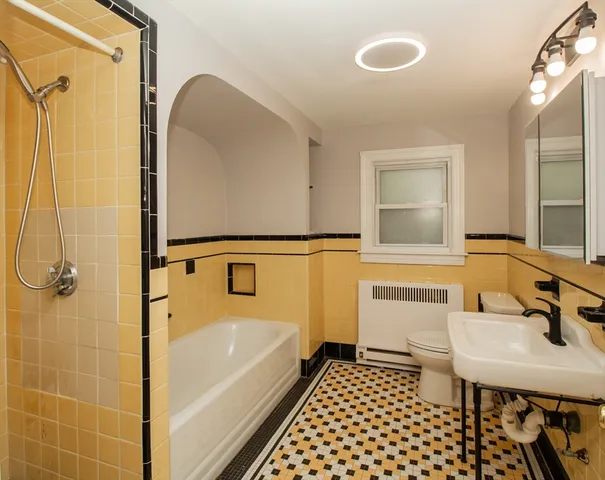 a bathroom with a sink and a bathtub