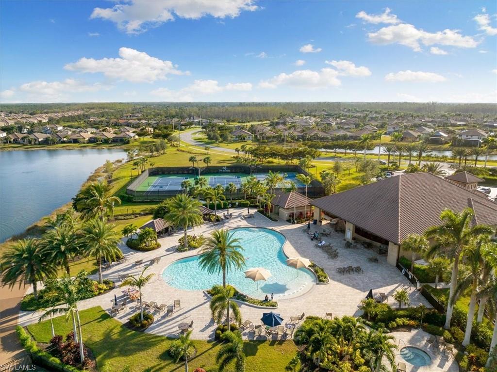20114 Eagle Stone Drive Estero, FL 33928 - Photo 2 of 4 an aerial view of residential houses with outdoor space and lake view in back
