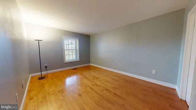 a view of a bathroom with a tub and shower