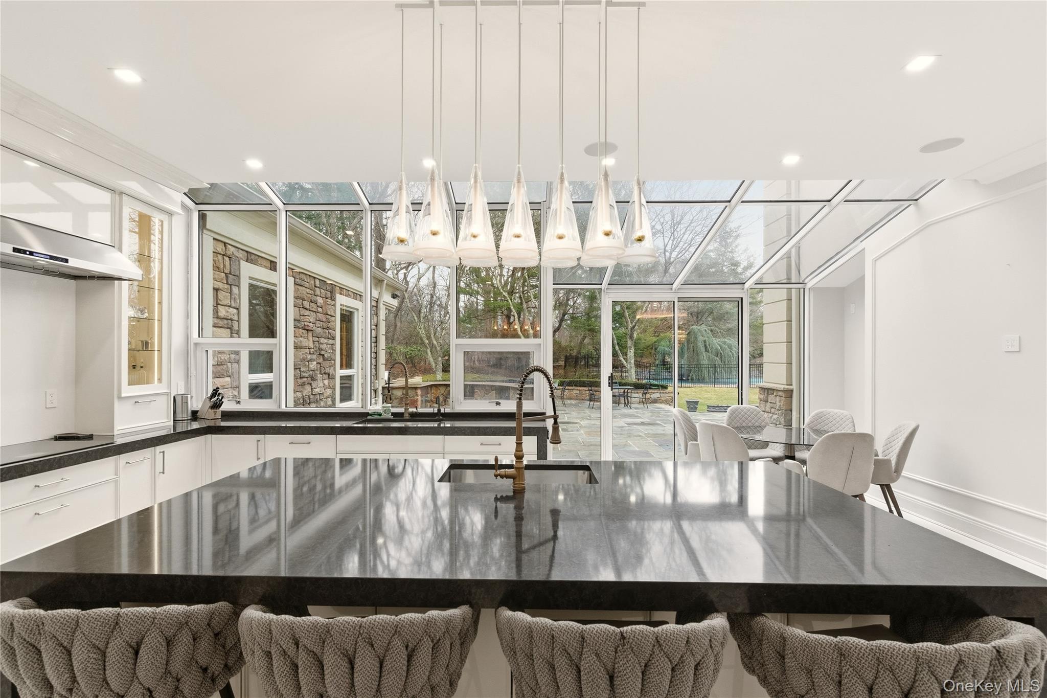 55 Coves Run Syosset, NY 11791 - Photo 15 of 50 a view of living room with furniture and floor to ceiling window