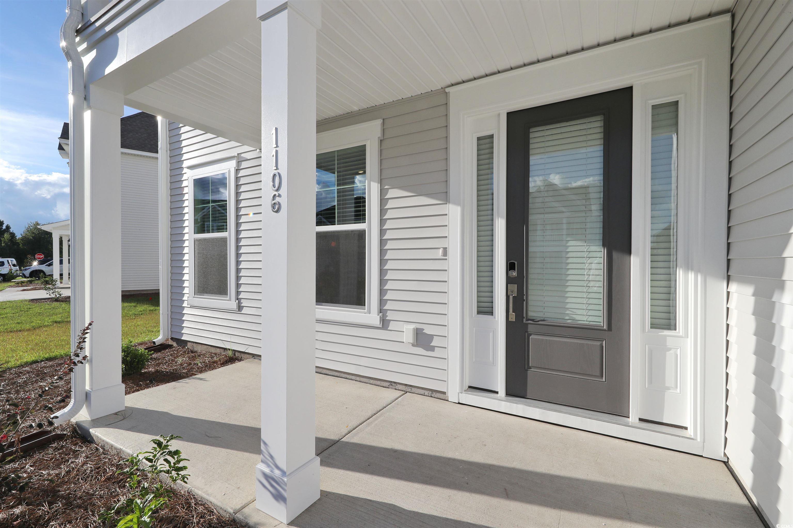 3121 Visionary Drive Myrtle Beach, SC 29588 - Photo 2 of 33 View of exterior entry featuring covered porch
