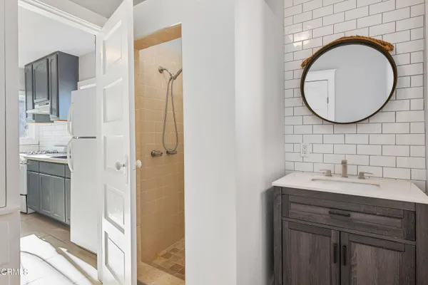 a bathroom with a sink and a mirror