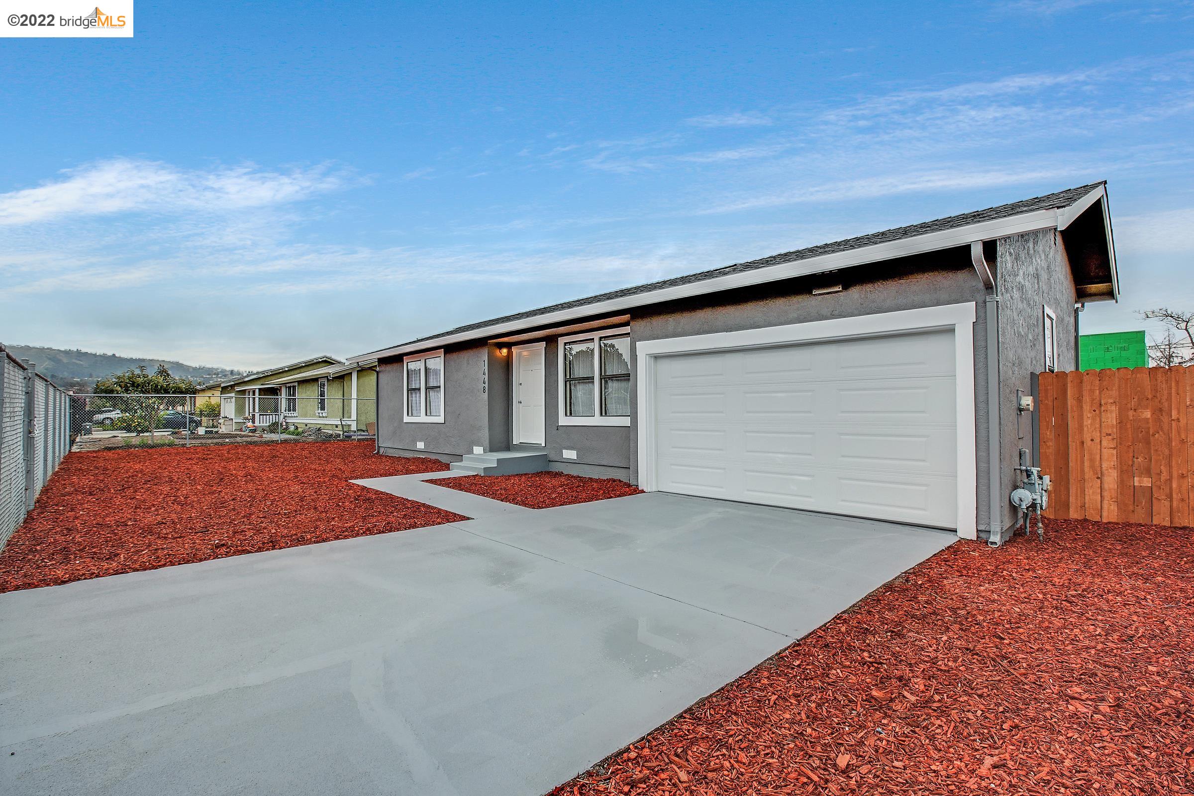 a front view of house with yard