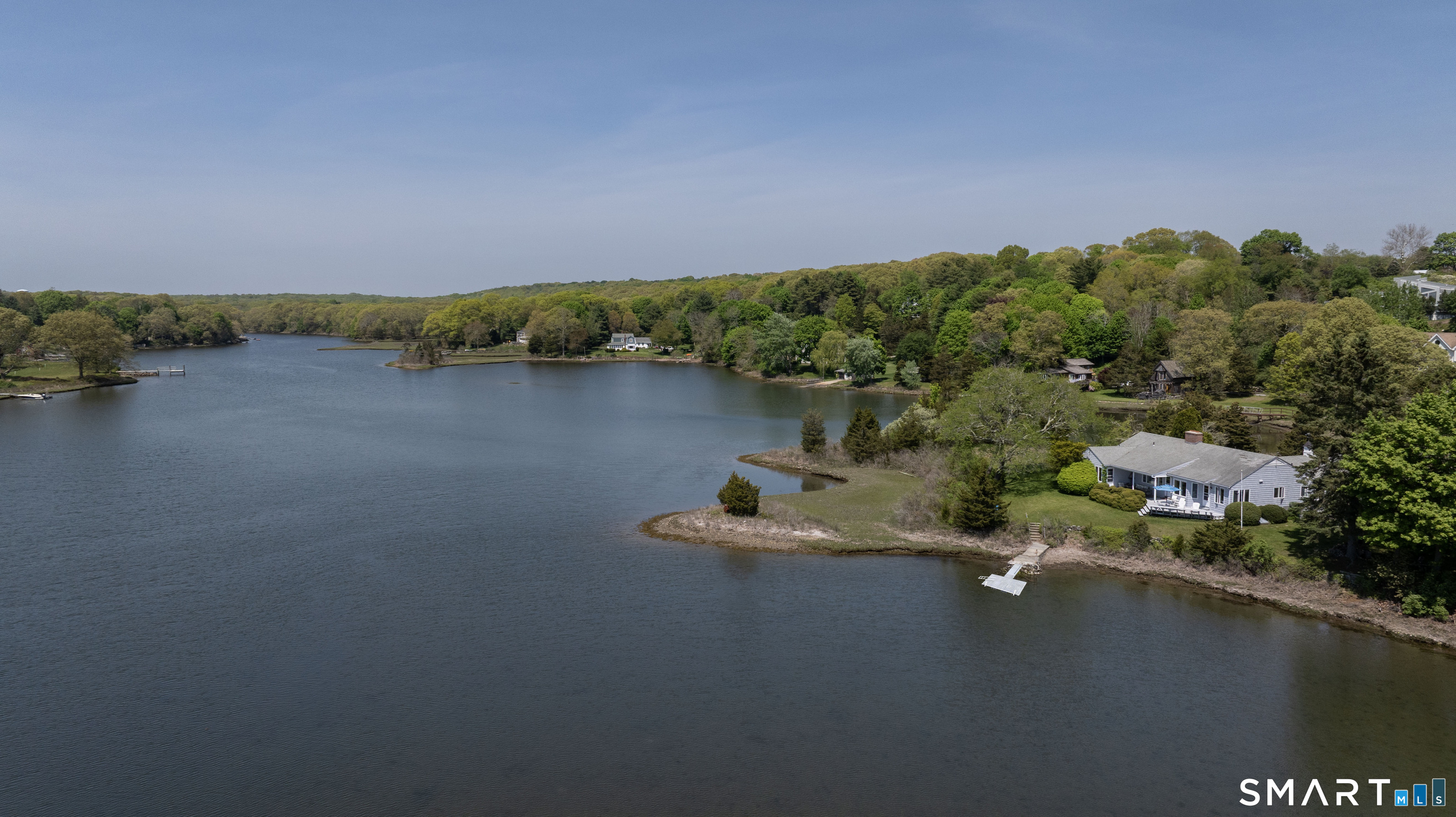 27 Wilbur Road Stonington, CT 06378 - Photo 3 of 40 a view of a lake with houses