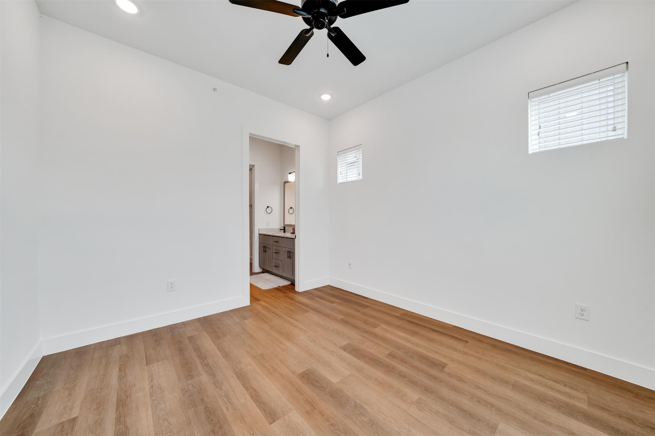 1601-121 Mustang Drive Marble Falls, TX 78654 - Photo 13 of 26 wooden floor in an empty room with a window
