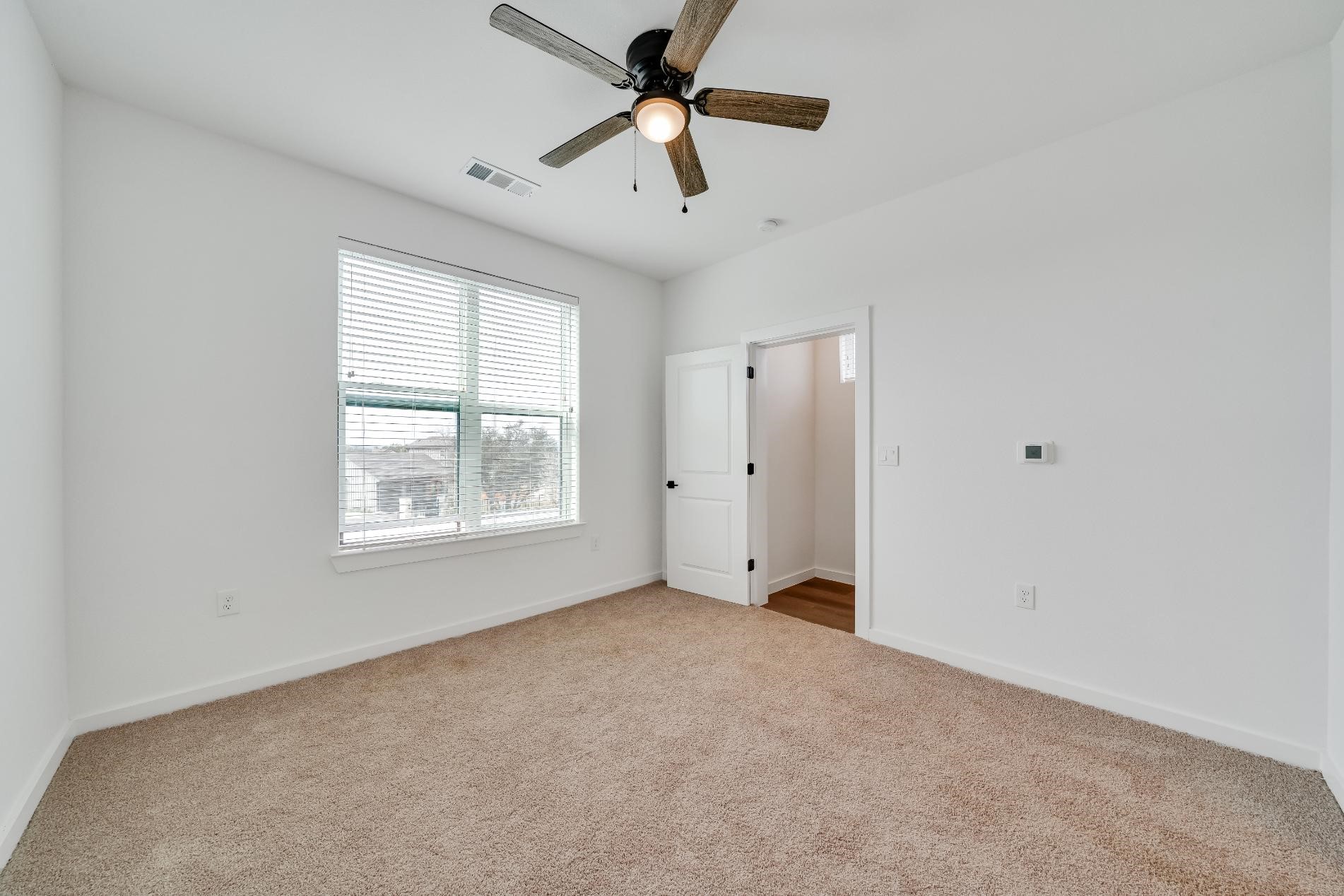 1601-121 Mustang Drive Marble Falls, TX 78654 - Photo 20 of 26 a view of an empty room with a window