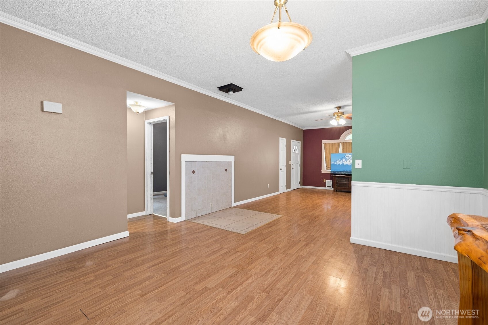 3710 Rucker Avenue Everett, WA 98201 - Photo 11 of 33 a view of empty room with wooden floor