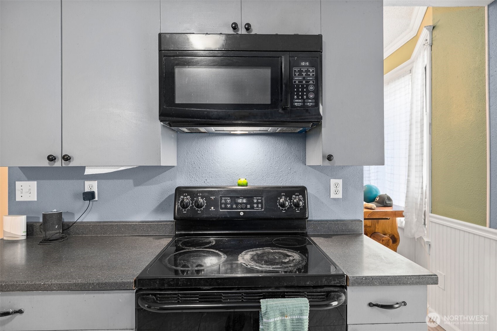 3710 Rucker Avenue Everett, WA 98201 - Photo 17 of 33 a kitchen with a stove and a microwave