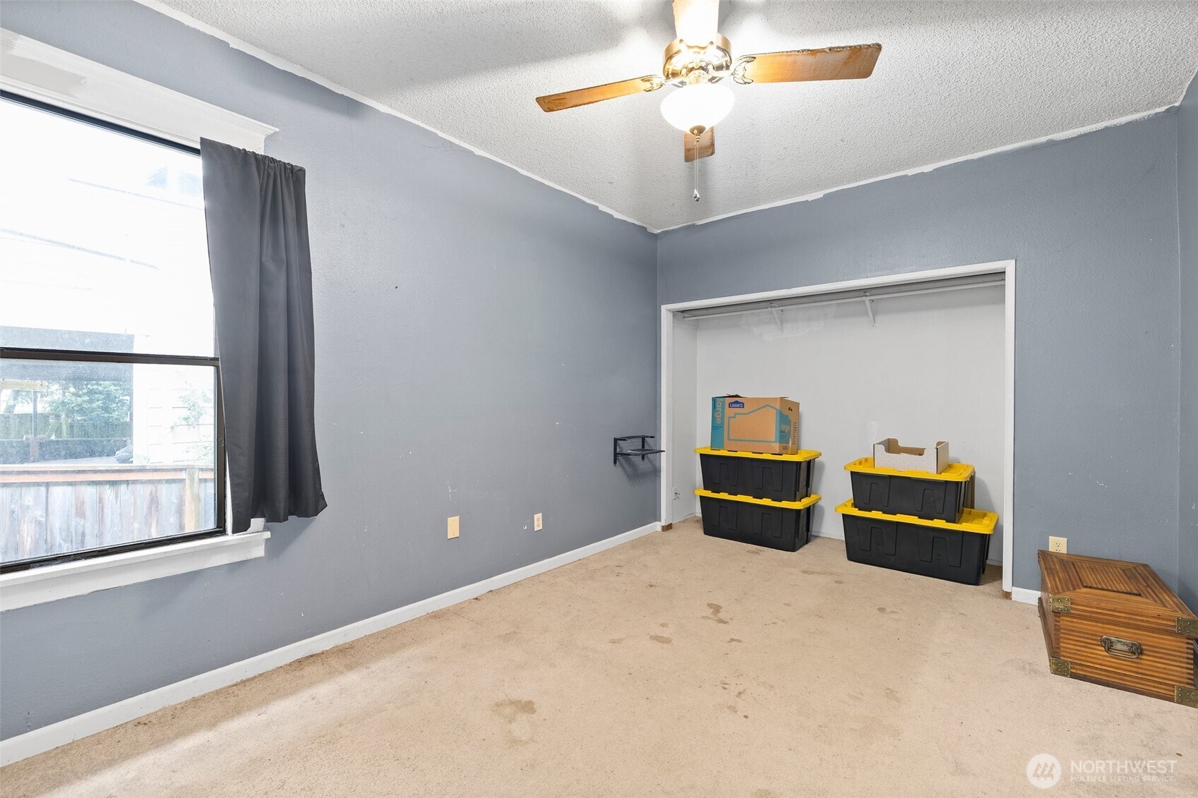 3710 Rucker Avenue Everett, WA 98201 - Photo 20 of 33 a bedroom with furniture and window