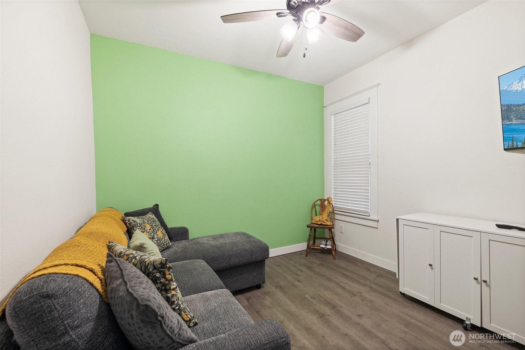 3710 Rucker Avenue Everett, WA 98201 - Photo 21 of 33 a living room with furniture and a wooden floor