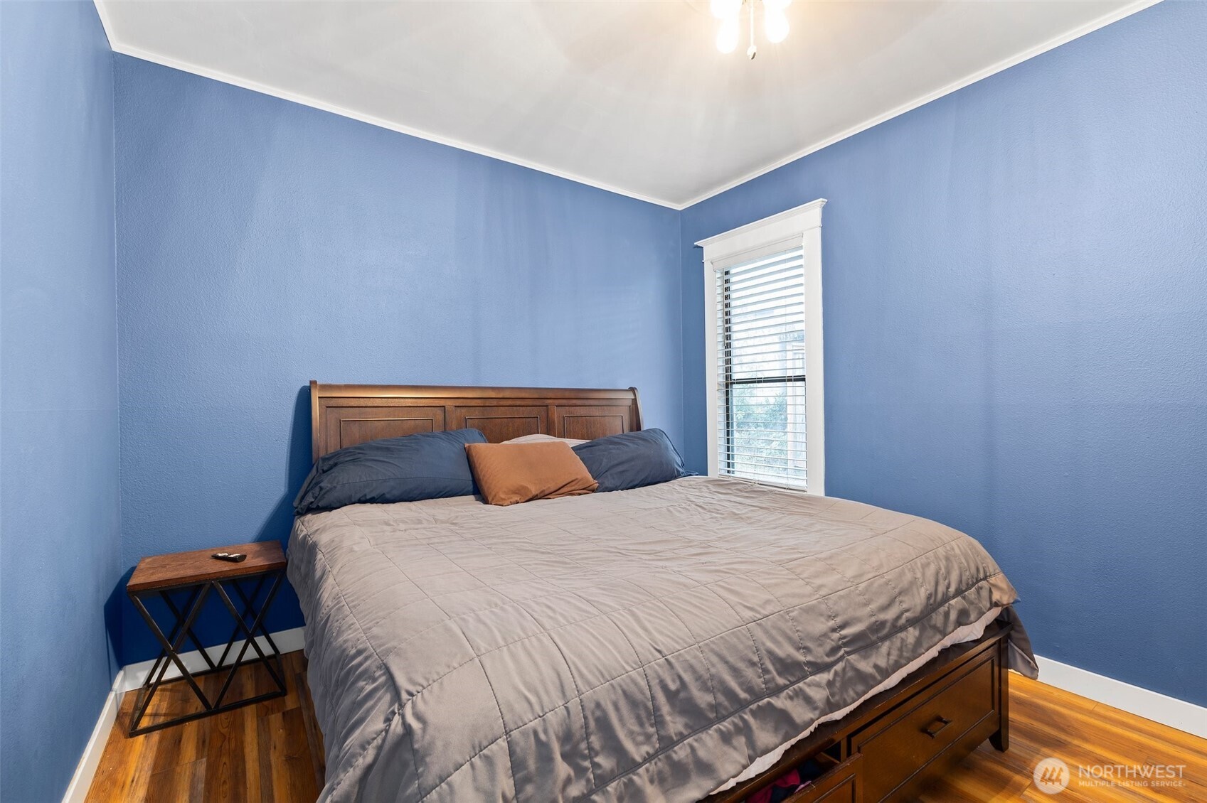 3710 Rucker Avenue Everett, WA 98201 - Photo 22 of 33 a bedroom with a bed and window