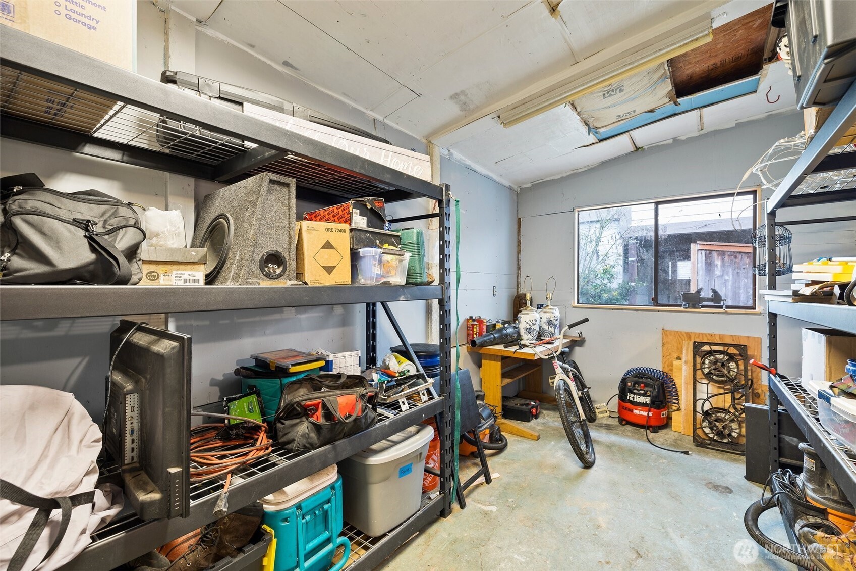 3710 Rucker Avenue Everett, WA 98201 - Photo 25 of 33 a view of a storage room with a lot of stuff