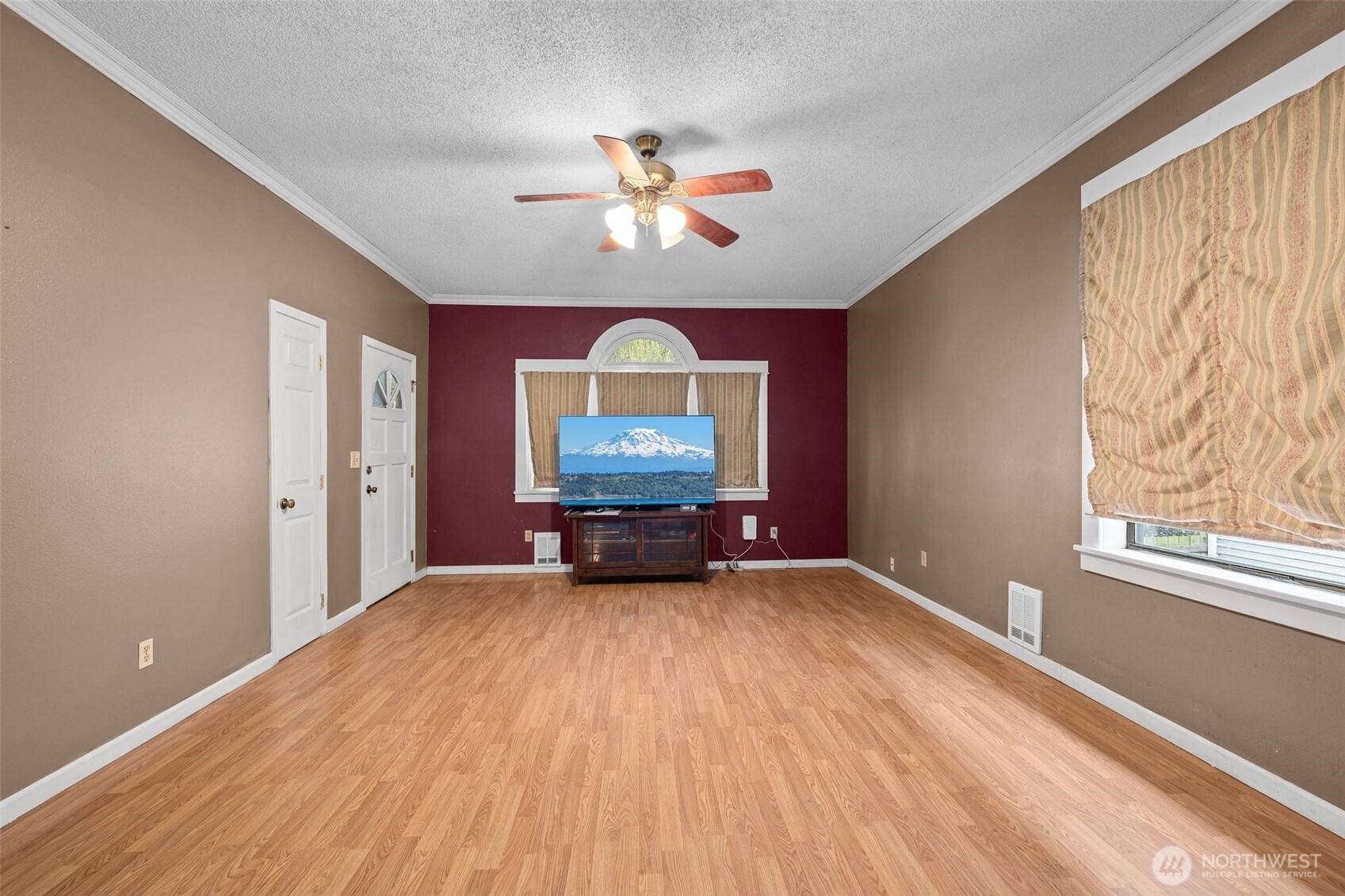 3710 Rucker Avenue Everett, WA 98201 - Photo 4 of 33 a view of a livingroom with a flat screen tv